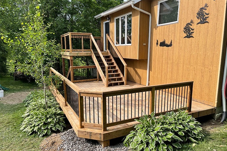photo of two level deck by complete carpentry