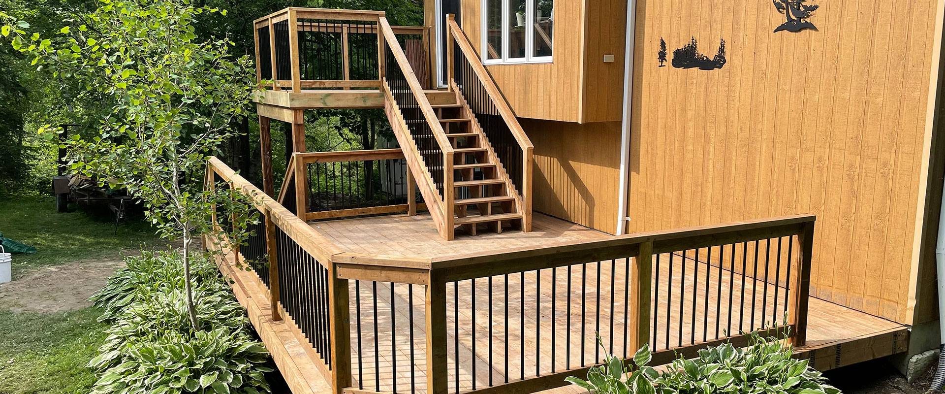 Photo of two level deck by complete carpentry